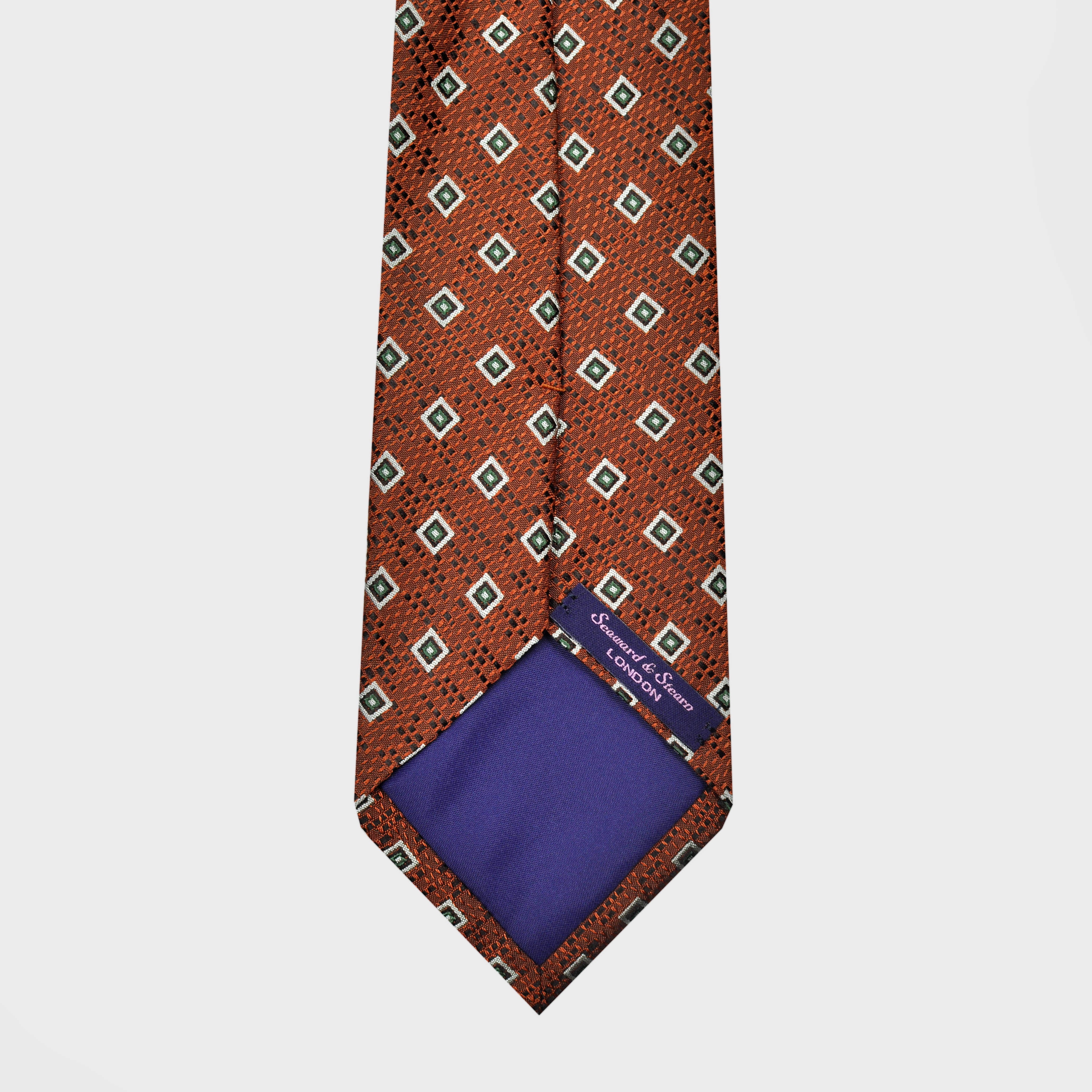 Repeat Little Diamonds on a Natte Tussah Silk Tie in Rusty Orange & Green