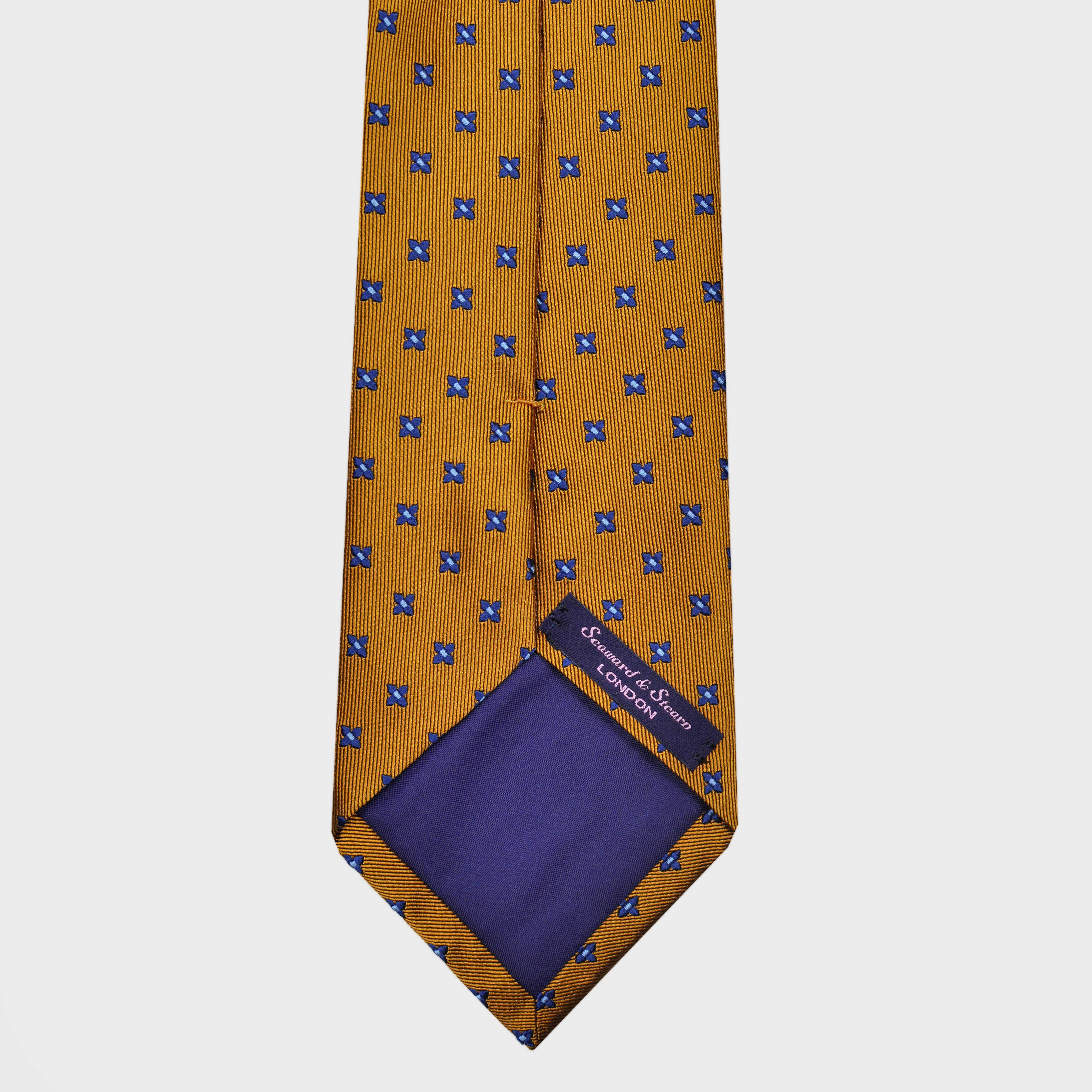 Little Repeat Blue Woven Florets on a Reppe Silk Tie in Gold
