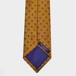 Little Repeat Blue Woven Florets on a Reppe Silk Tie in Gold